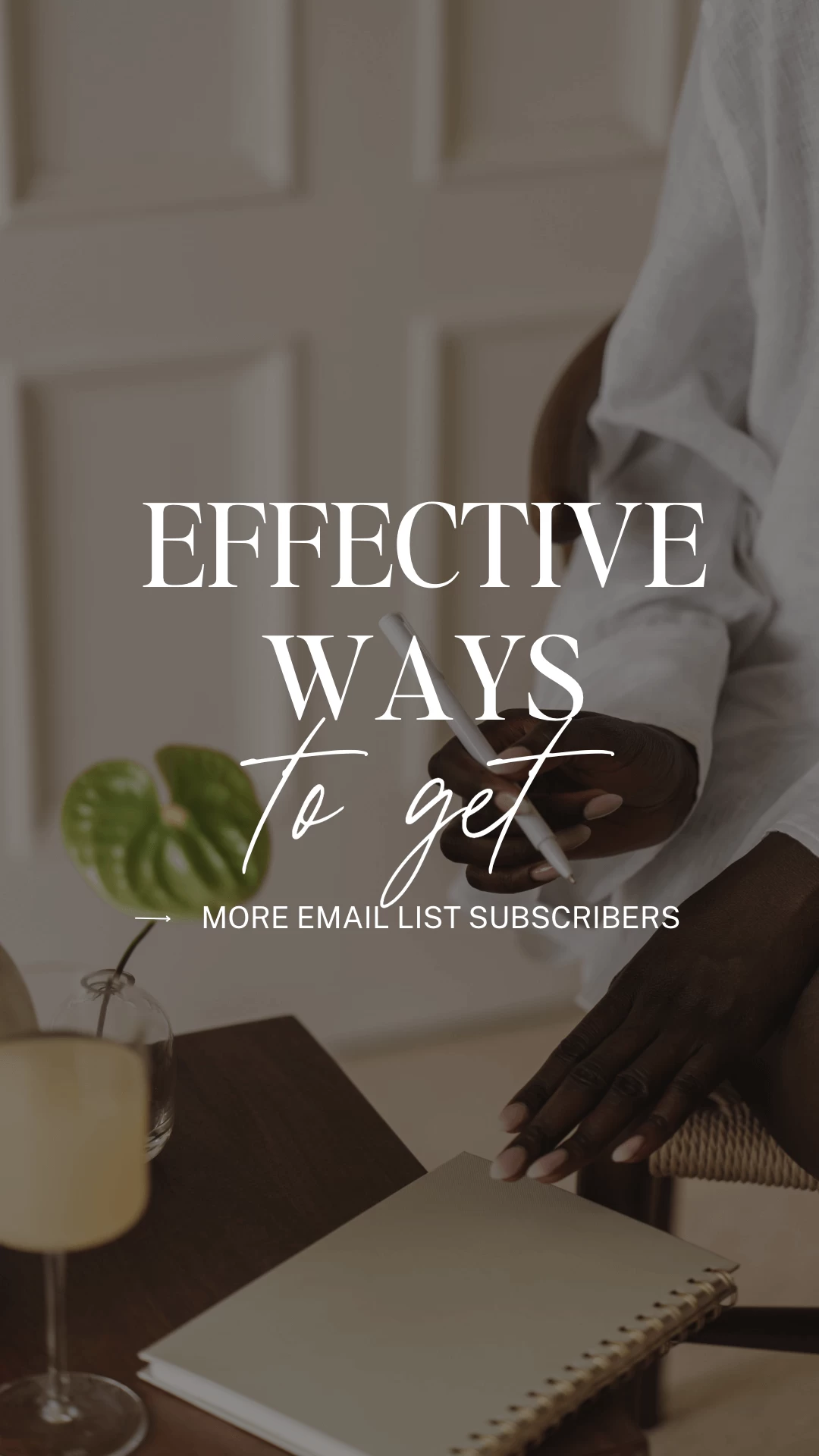 woman of colour holding a pen sitting on a wacker chair