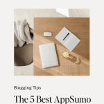 laptop and glass of water on table