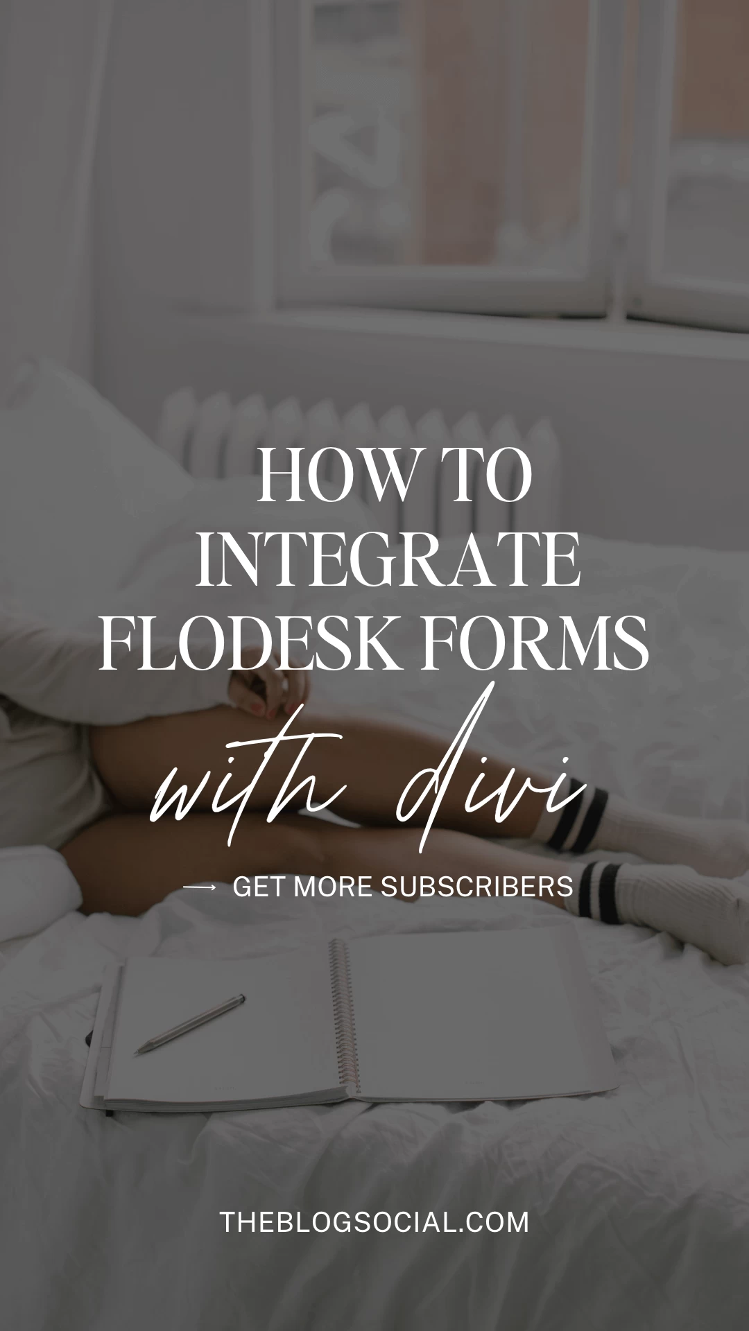 woman laying in bed with notebook and pen