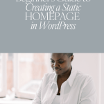 woman in white shirt sitting at desk, typing on laptop